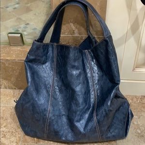 Textured leather handbag